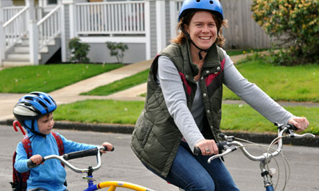 Mother and son cycling to school Mother and son cycling to school