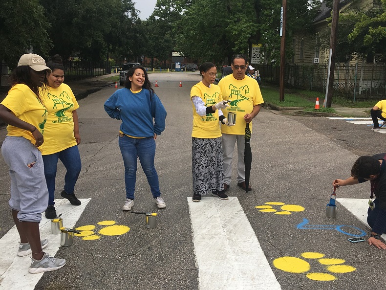 youth painting crosswalk