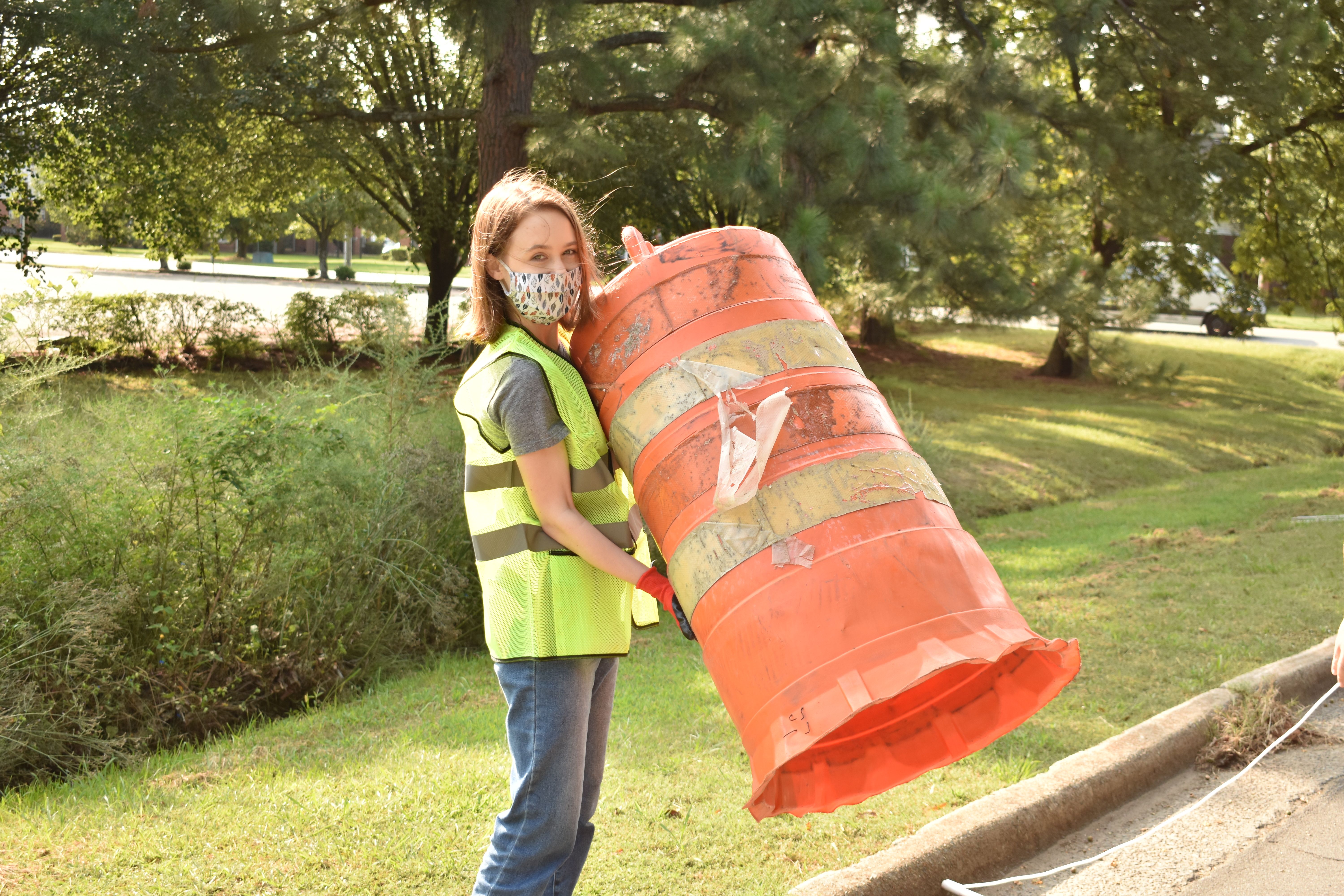 Volunteer setting up barrel