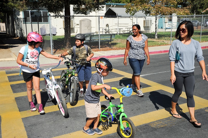 Kids walking and biking