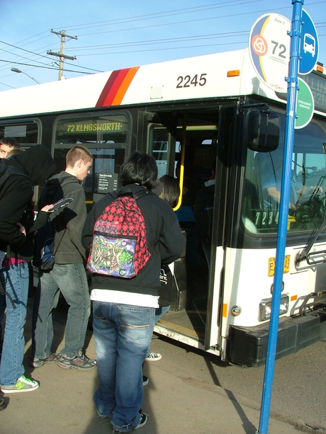 Students loading transit