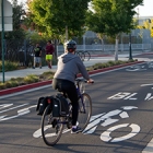 person biking in bike lane