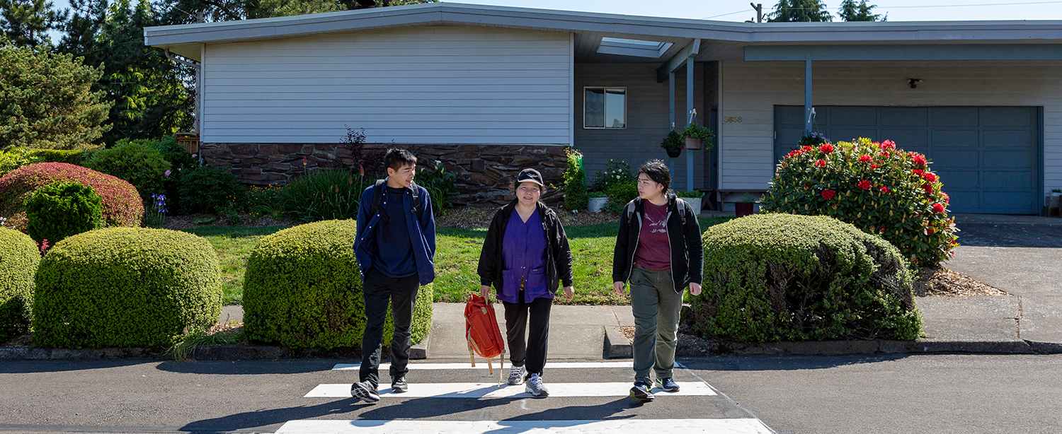 family in crosswalk