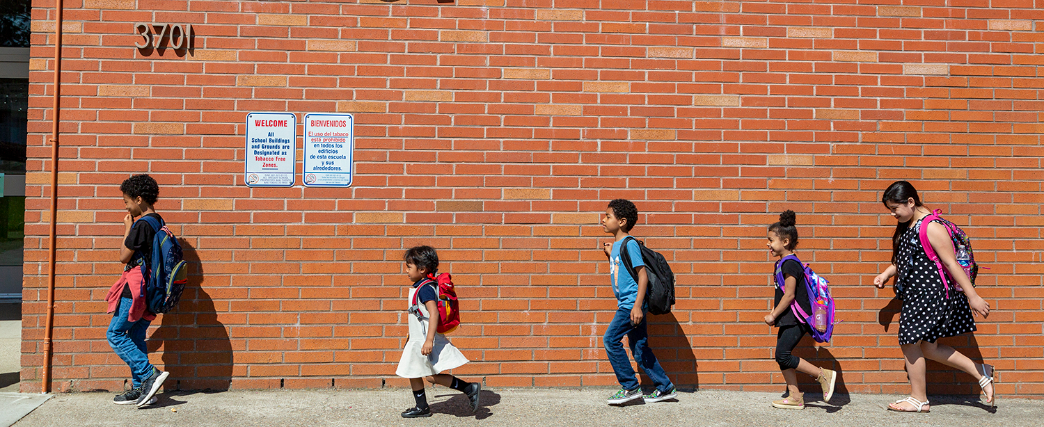kids in front of school